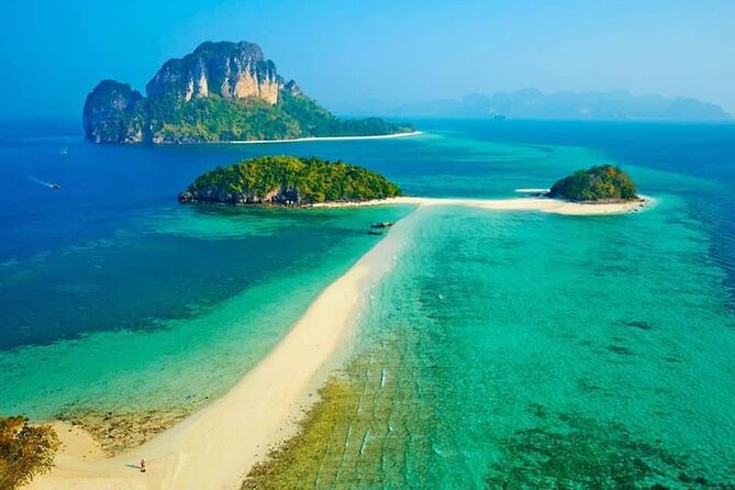 Early bird Krabi to Phi Phi islands + 4 Islands by Speedboat - Bamboo Island and the Four Islands run: where the day turns postcard-fast