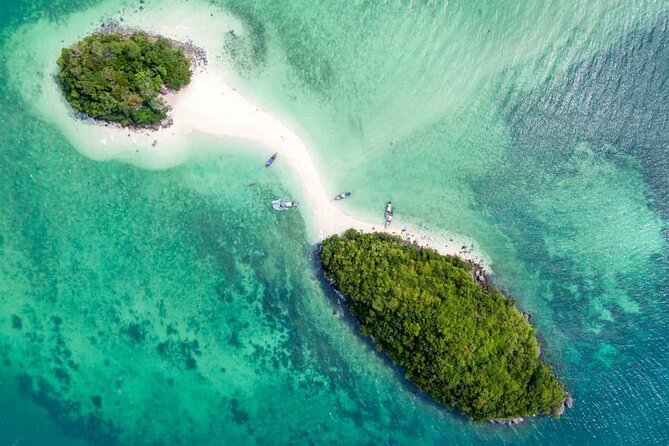 Early bird Phi Phi islands and 4 Islands by Speedboat Tour - Early morning timing: why it changes everything at Maya Bay