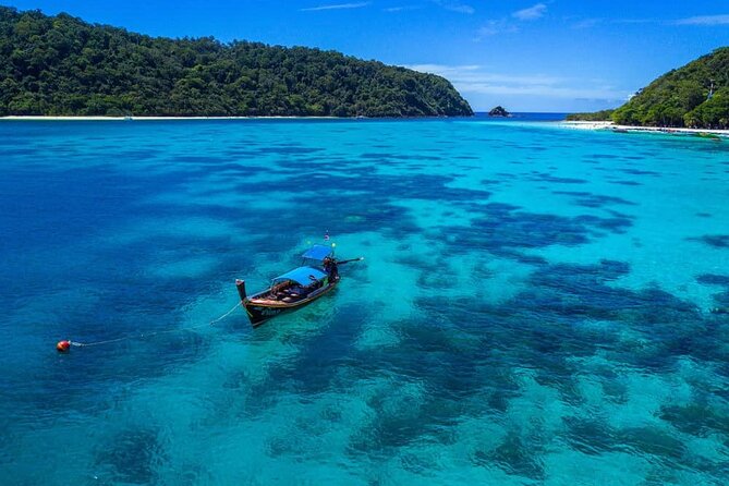 Early bird Phi Phi islands and 4 Islands by Speedboat Tour - Pileh Lagoon and the limestone-bowl feeling