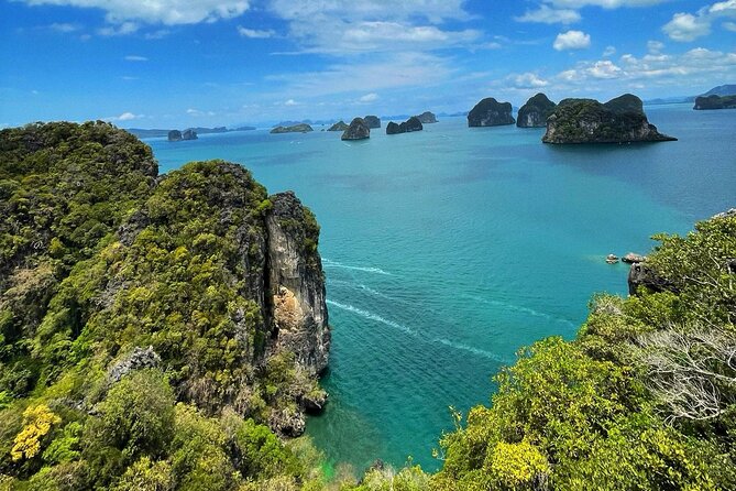 Hong Islands Trip Premium Speedboat from Krabi - Hong Island lagoon: emerald water and cliff walls