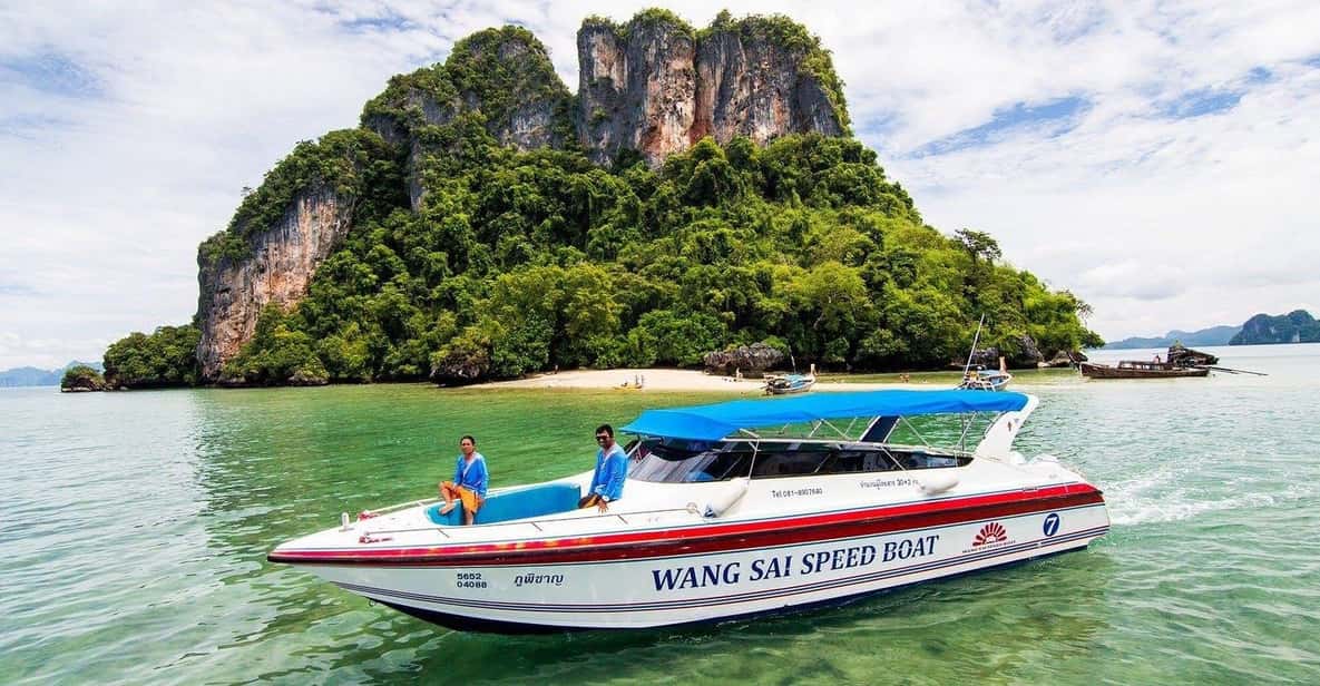 Krabi: 4 Island Whirlwind Tour with Caves, Sandbars & Reefs - Railay Beach cliffs and the Phra Nang Cave Beach shrine moment