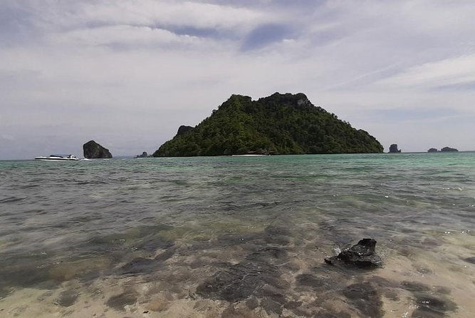 Krabi 7 Islands Sunset and Bioluminescence Tour Include BBQ Dinner - Seven islands by speedboat: Poda, Chicken, Taming, and the limestone scenery